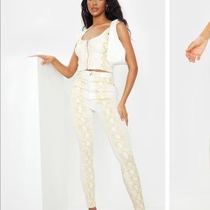 snake print skinny jeans